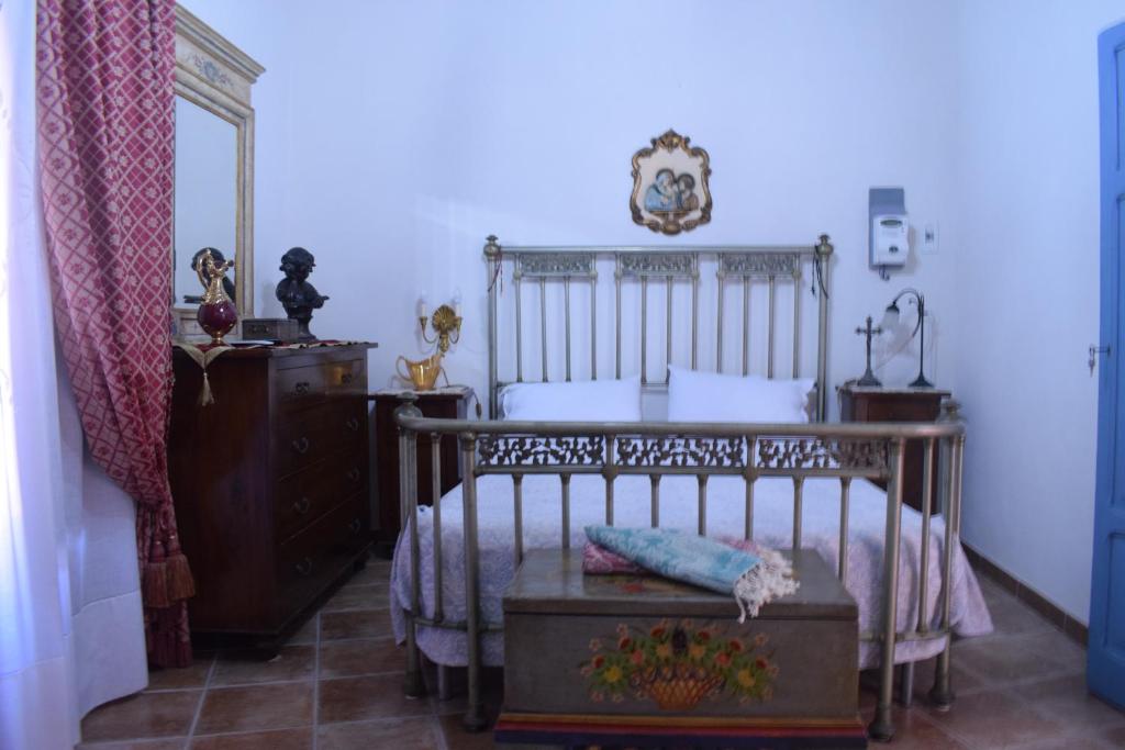A bed or beds in a room at B&b Lemon Garden