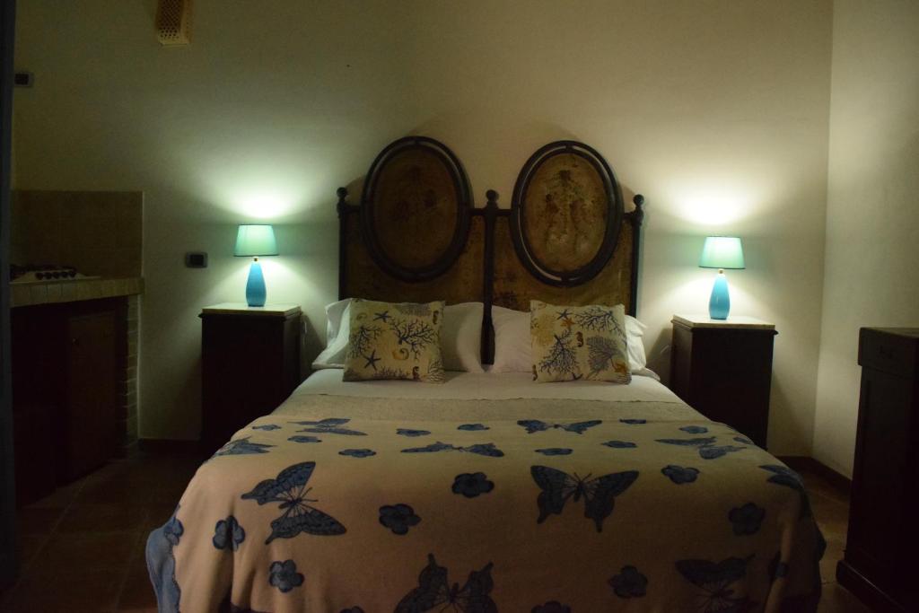A bed or beds in a room at B&b Lemon Garden