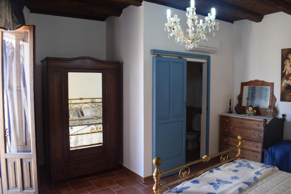 A bed or beds in a room at B&b Lemon Garden