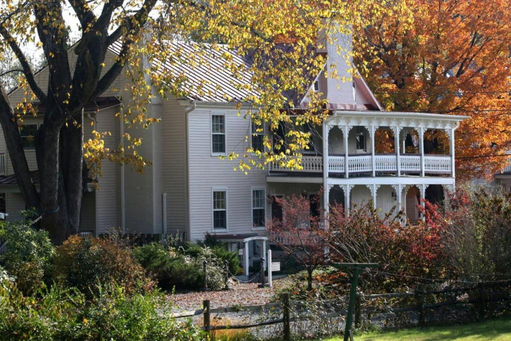 a large white house with a gazebo at Hopkins Ordinary Bed, Breakfast and Ale Works in Sperryville