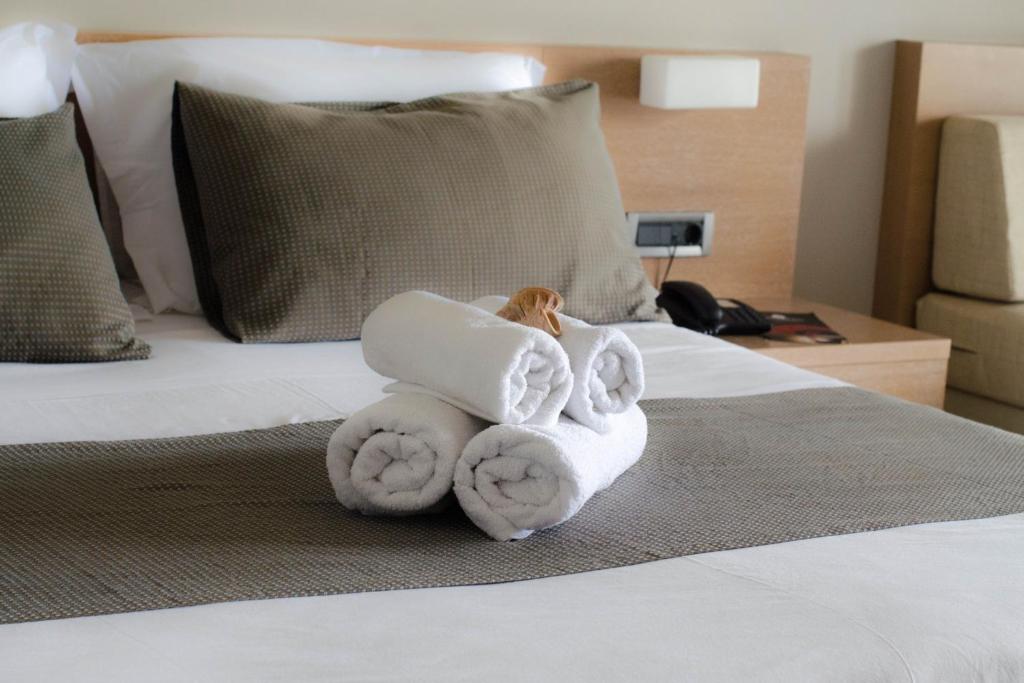 Posteľ alebo postele v izbe v ubytovaní Nautilus Bay Hotel
