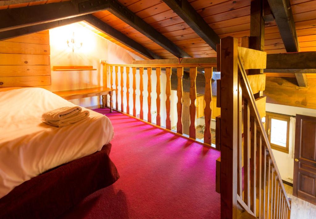 Postel nebo postele na pokoji v ubytování Balcon del Pirineo Rural Ordesa