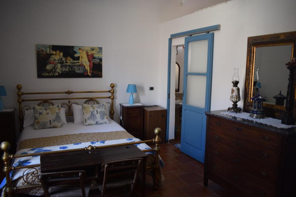 A bed or beds in a room at B&b Lemon Garden