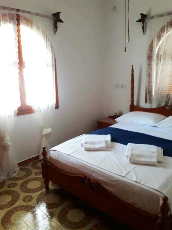 Posteľ alebo postele v izbe v ubytovaní Apollonion Apartment Aigina