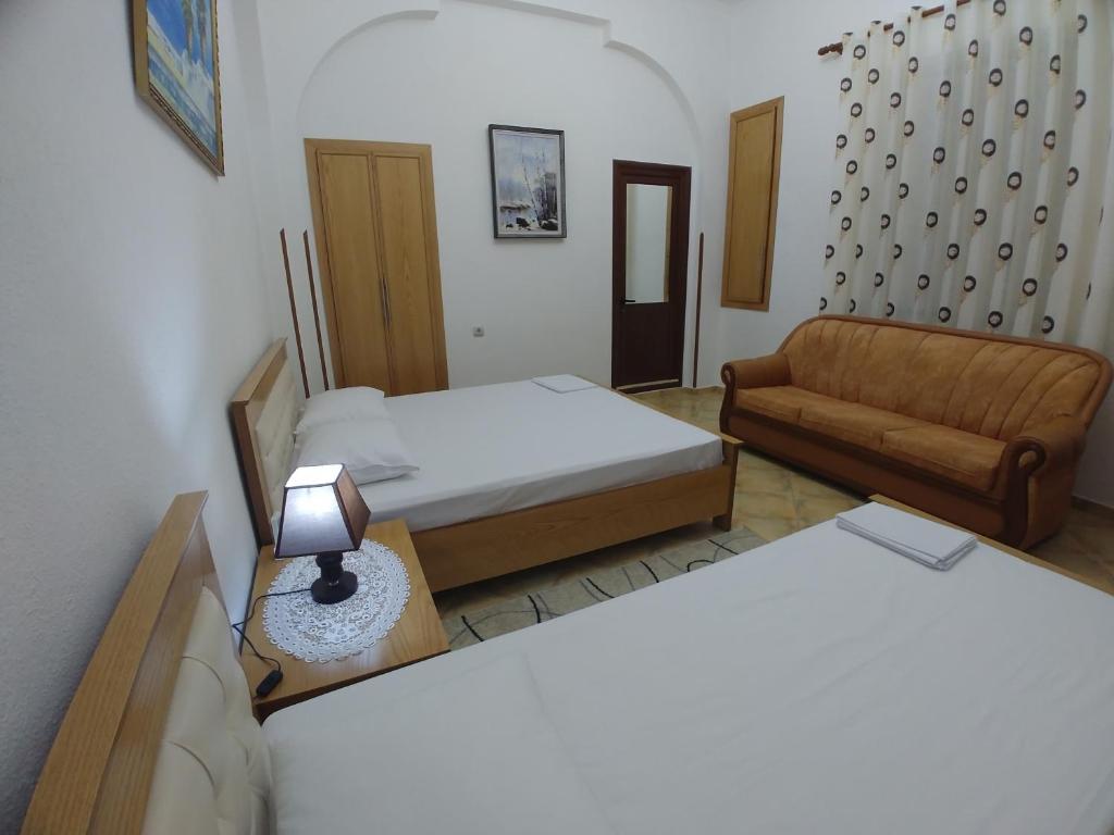 Letto o letti in una camera di Guest House Urat