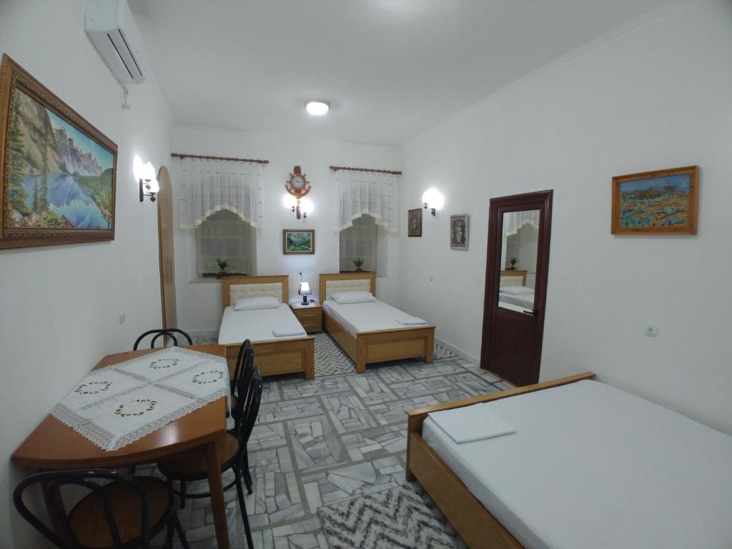 Letto o letti in una camera di Guest House Urat