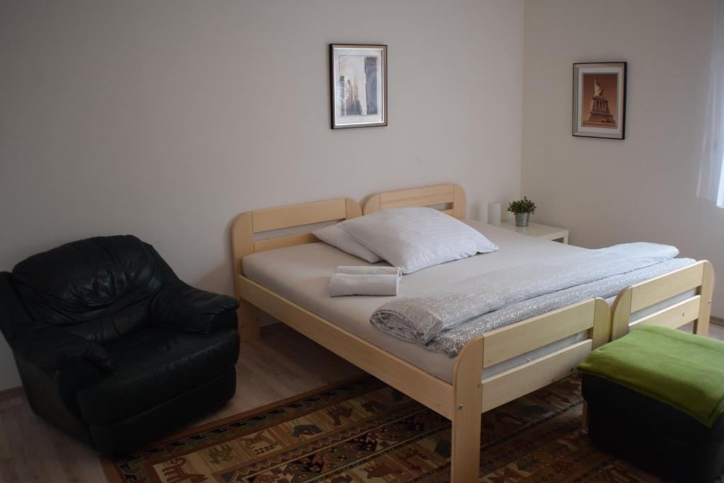 Postel nebo postele na pokoji v ubytování Apartmány Lípa