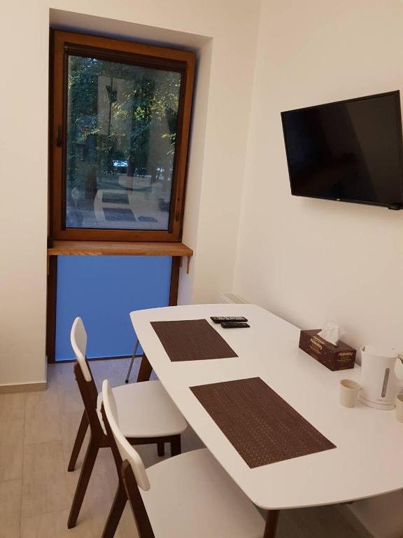 TV a/nebo společenská místnost v ubytování Kolmark Residence