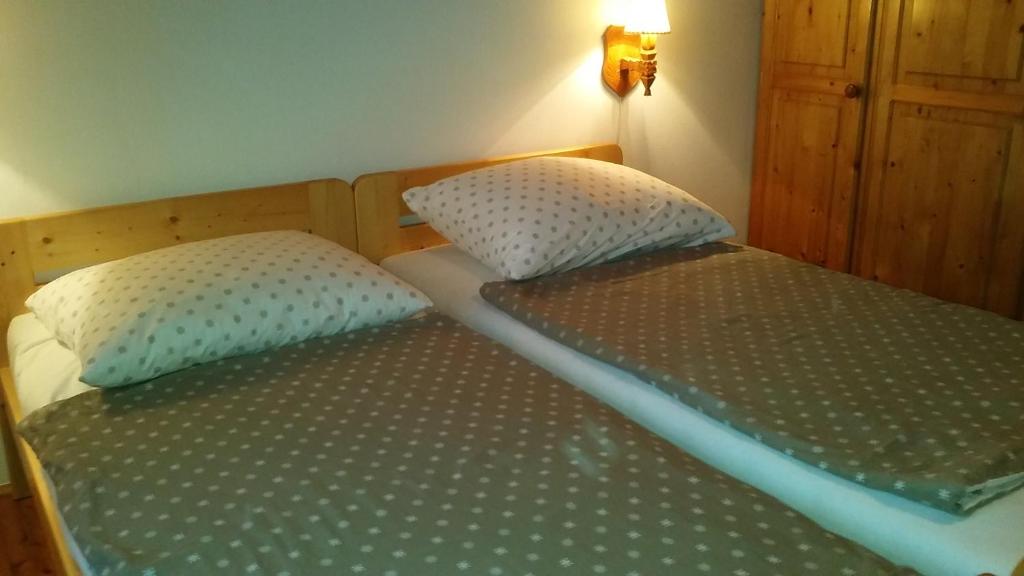 Postel nebo postele na pokoji v ubytování Frutta Villa