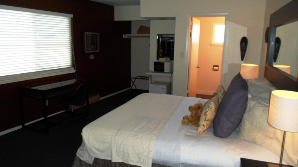 Postel nebo postele na pokoji v ubytování Paradice Motel