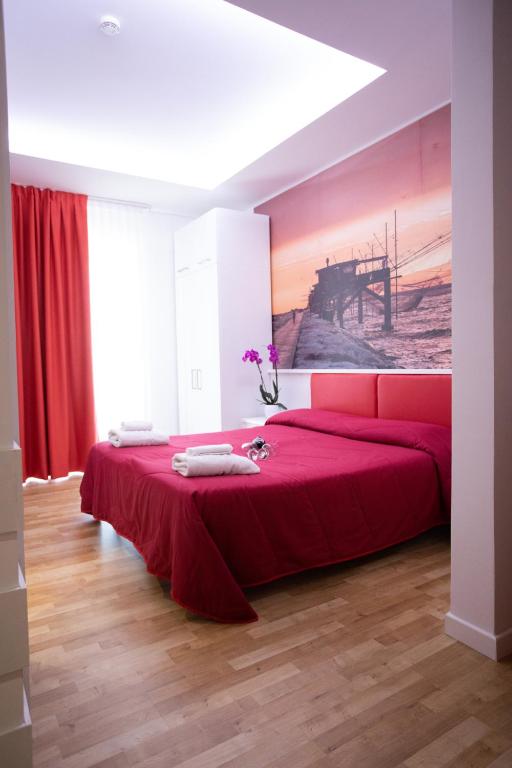 Postel nebo postele na pokoji v ubytování Hotel Ragno D'Oro