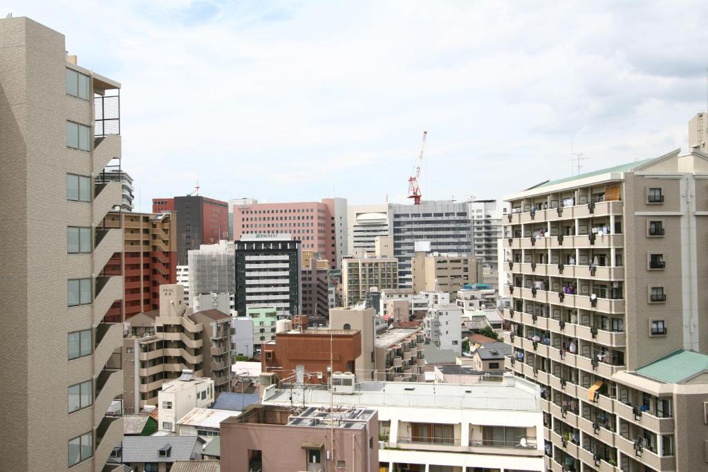 Nespecifikovaný výhled na destinaci Fukuoka nebo výhled na město při pohledu z aparthotelu