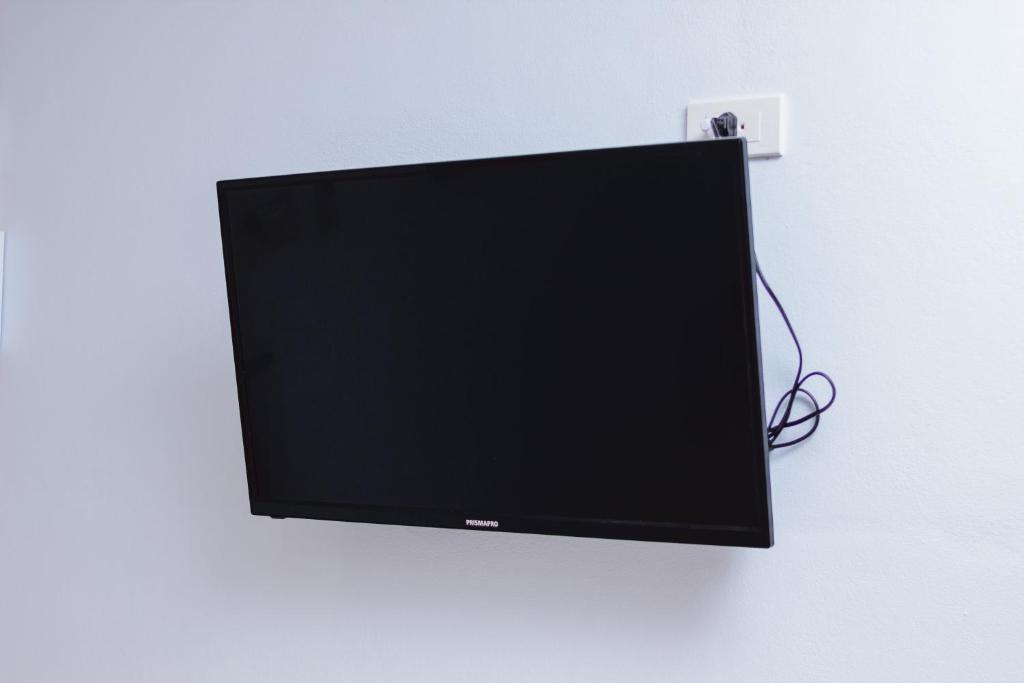 TV a/nebo společenská místnost v ubytování Samrong Garden