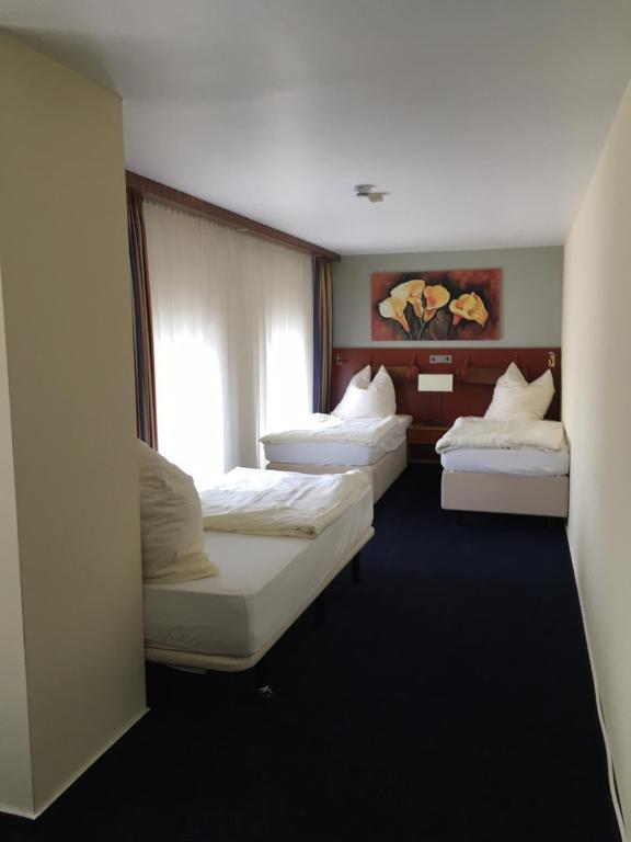Postel nebo postele na pokoji v ubytování Motel Monteur