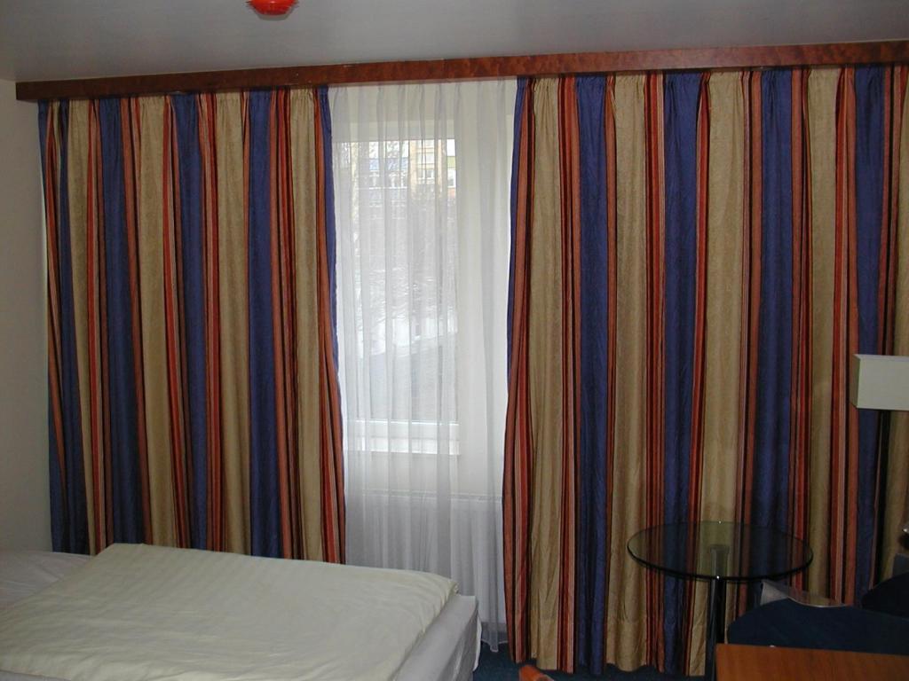 Postel nebo postele na pokoji v ubytování Motel Monteur
