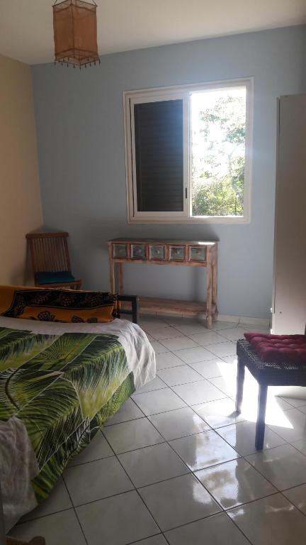 Postel nebo postele na pokoji v ubytování lakazadom974 - Chambres d'Hôtes