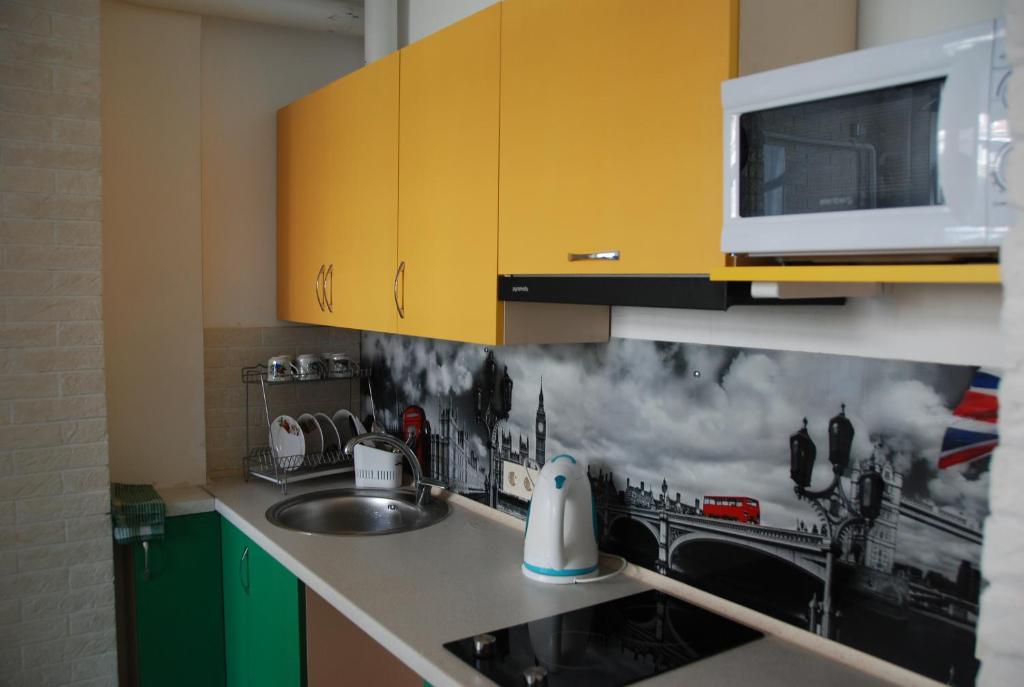 Kuchyň nebo kuchyňský kout v ubytování Green Apple Hostel