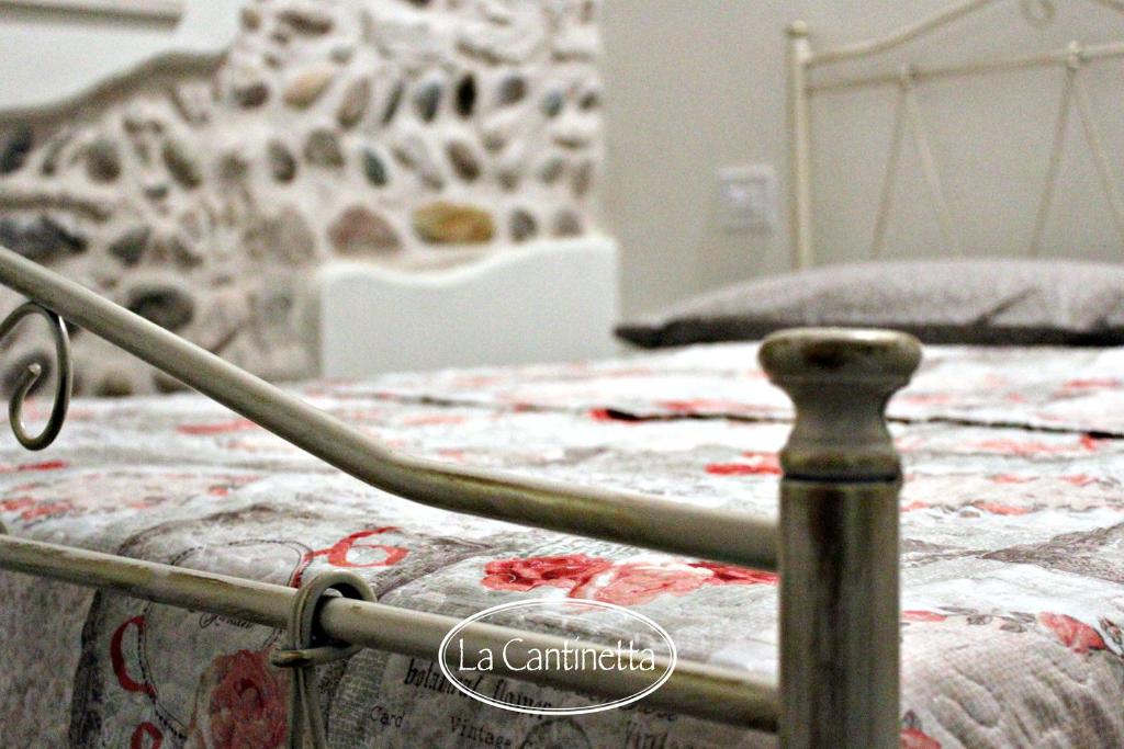 Letto o letti in una camera di B&B La Piazzetta