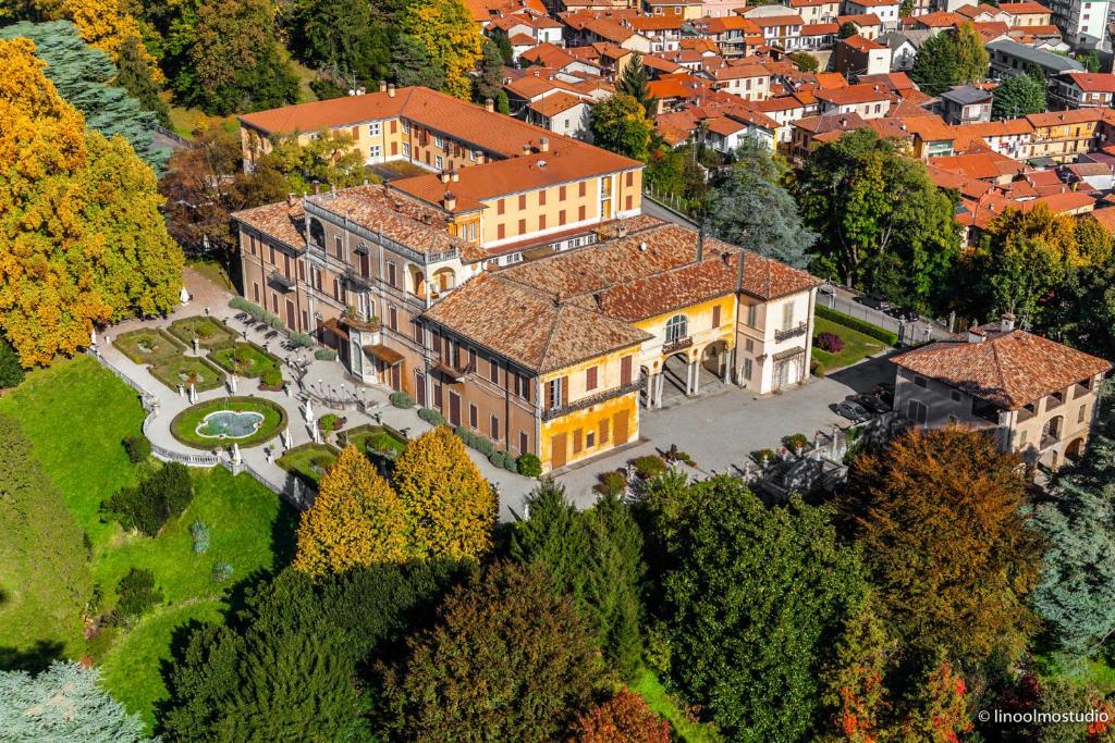 an aerial view of a large house with a yard at Villa Cagnola in Varese