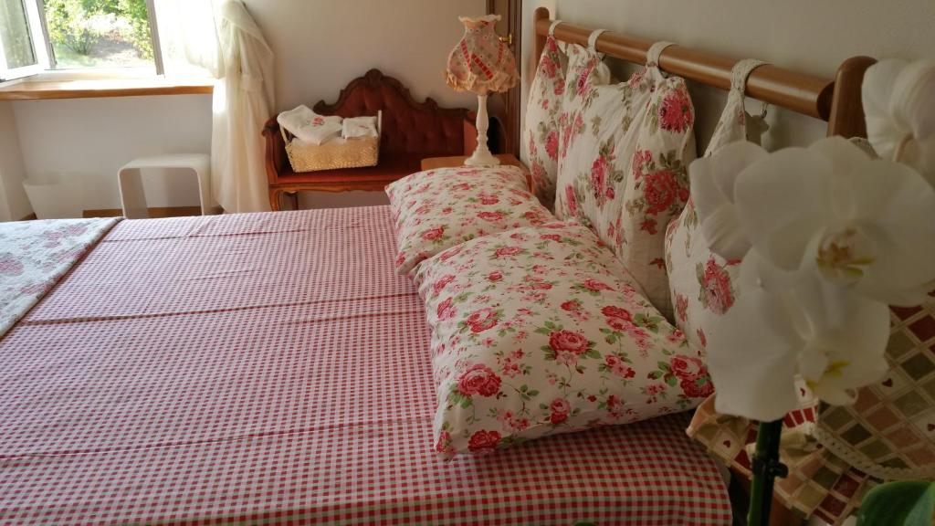 Postel nebo postele na pokoji v ubytování Bed & Bistrò Che Piasì