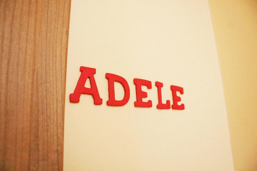 aadobeadobe sign on a wall with the word adelaide at BB Aretè in Scilla