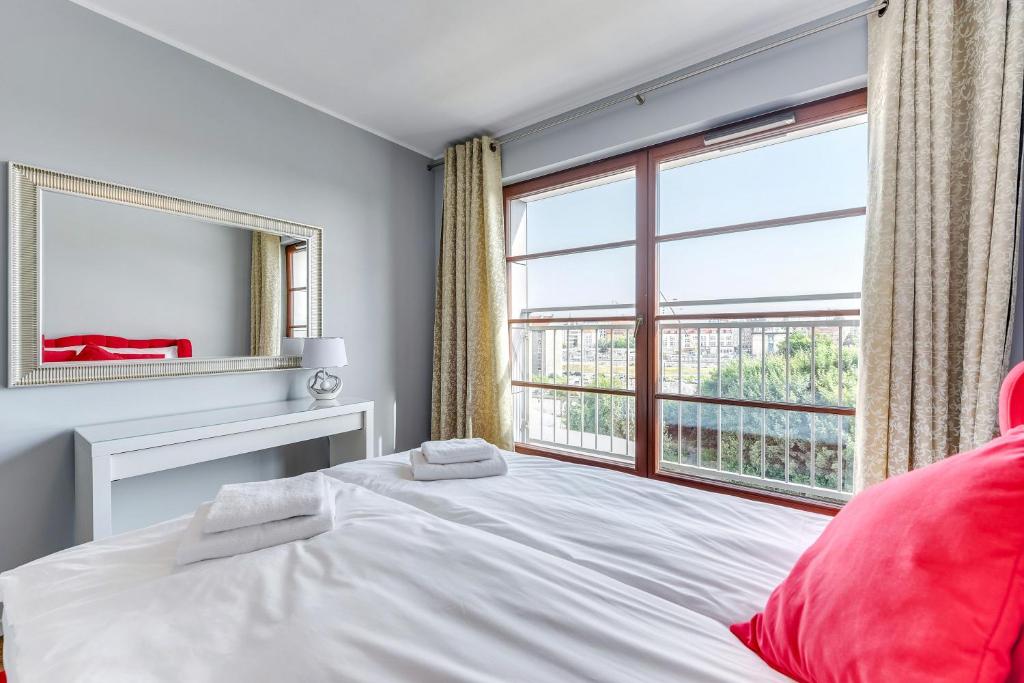 Posteľ alebo postele v izbe v ubytovaní GRANO APARTMENTS Gdańsk Motława SPA & Wellness