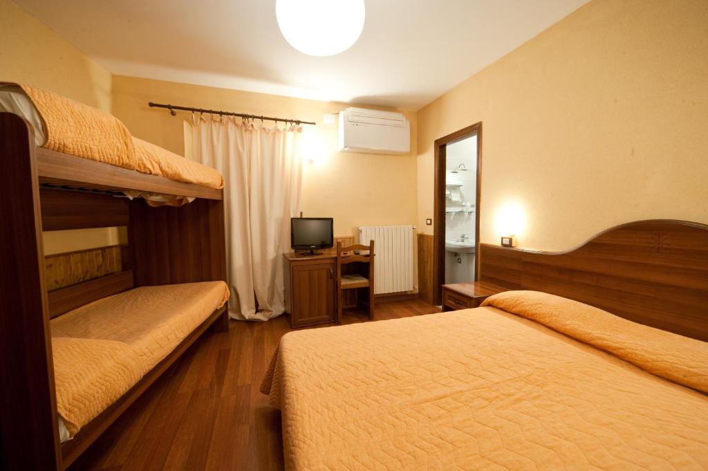 Postel nebo postele na pokoji v ubytování Hostaria da Lino