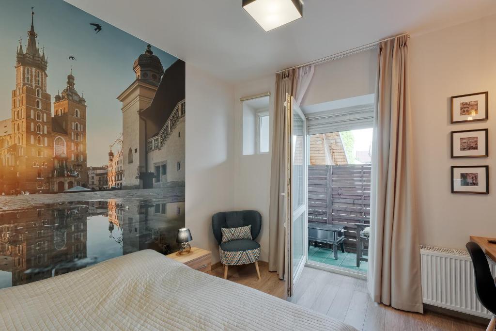 Posteľ alebo postele v izbe v ubytovaní Krakow For You Budget Apartments