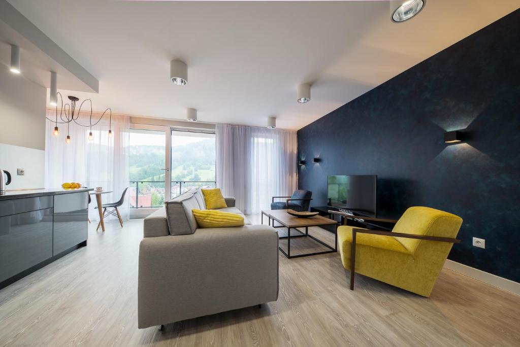 Posezení v ubytování Apartament Pod Lasem