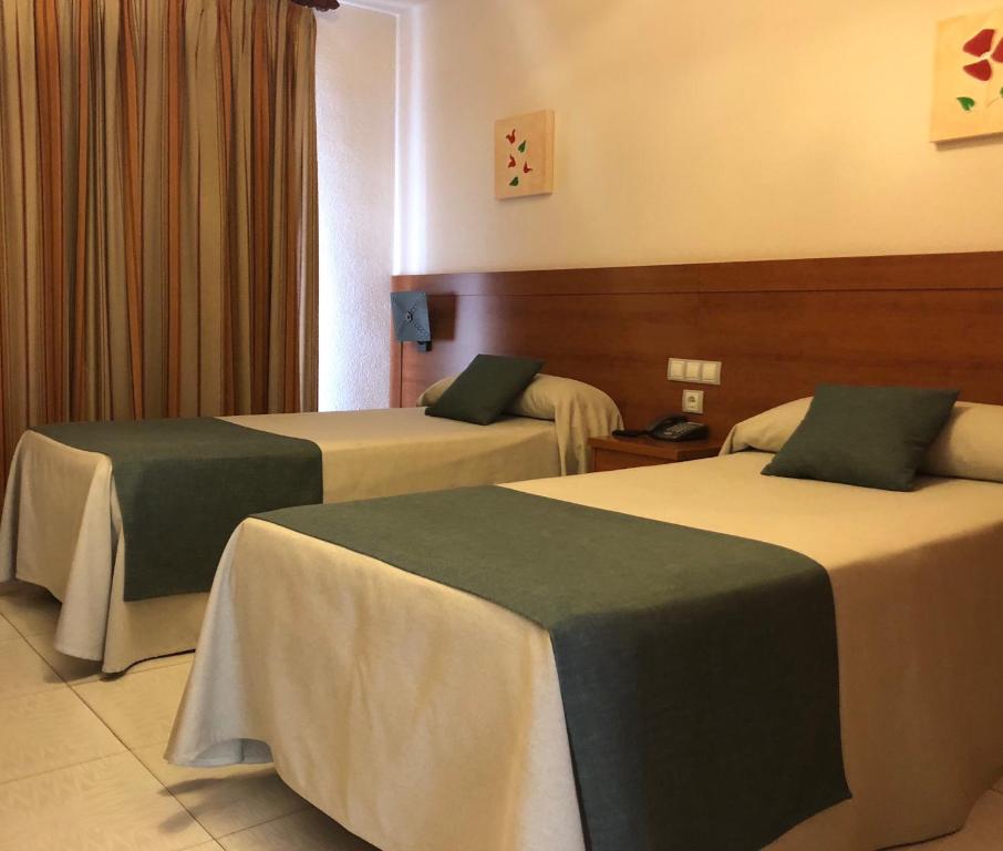 Postel nebo postele na pokoji v ubytování El Paso