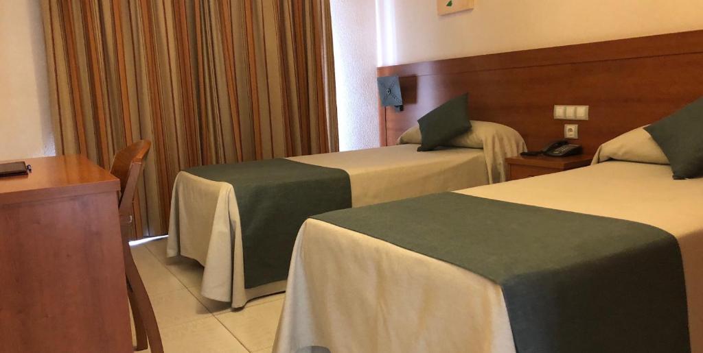 Postel nebo postele na pokoji v ubytování El Paso