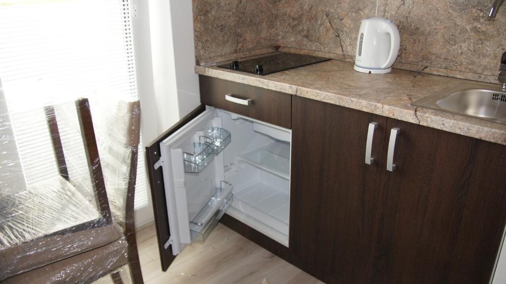 Kuchyň nebo kuchyňský kout v ubytování Apartmany pri lese