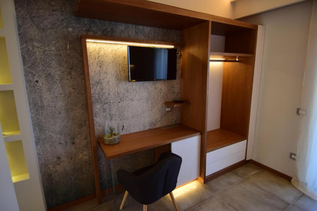 TV a/nebo společenská místnost v ubytování B&B Maestrale