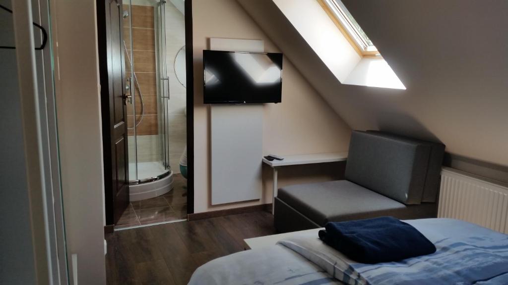 Postel nebo postele na pokoji v ubytování Csöpi Panzió