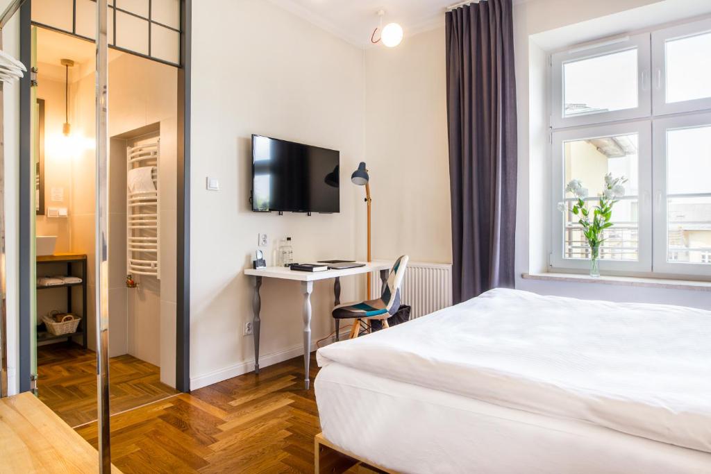 Posteľ alebo postele v izbe v ubytovaní NOVUMHOUSE - Tomasza