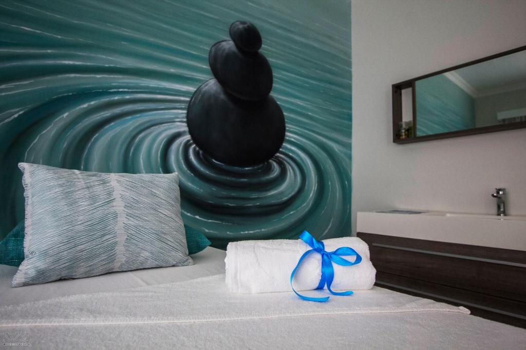 Postel nebo postele na pokoji v ubytování Tiduca Hotel