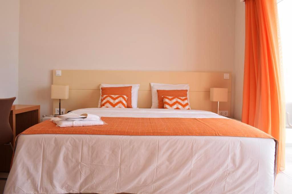Postel nebo postele na pokoji v ubytování Tiduca Hotel