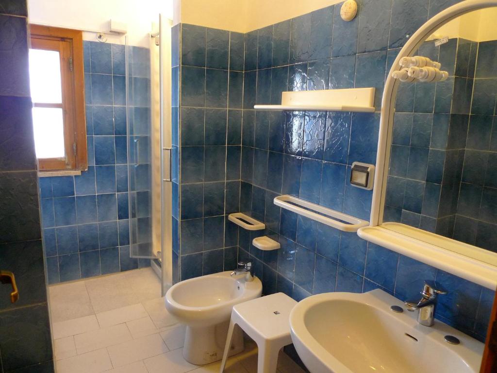 Koupelna v ubytování Hotel Alexander