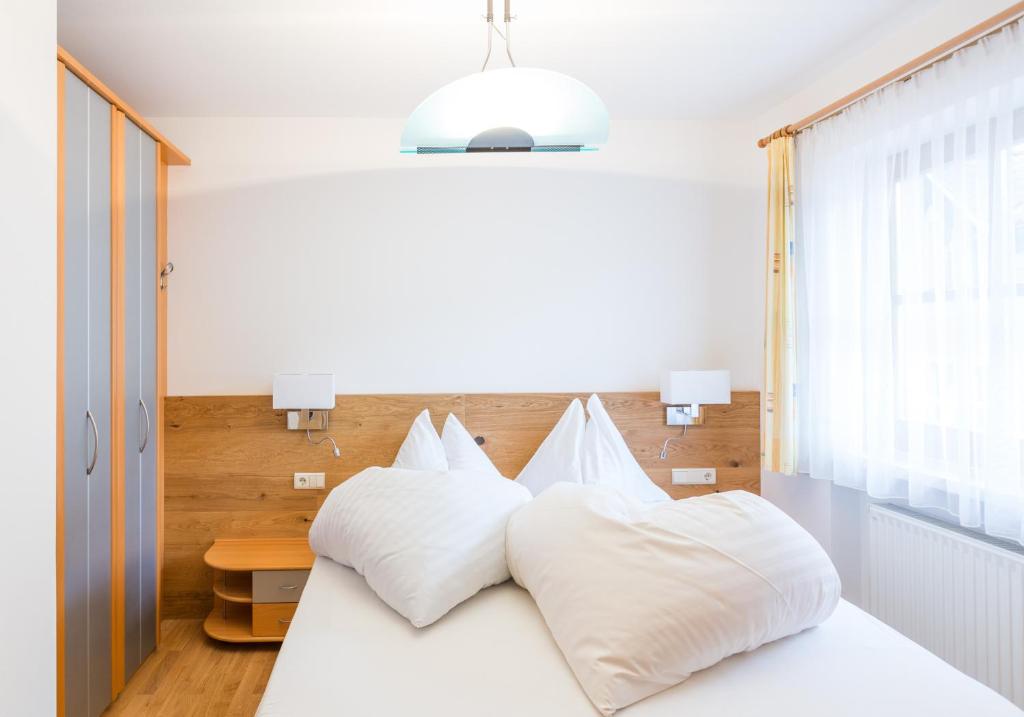 Postel nebo postele na pokoji v ubytování Hotel Seppi