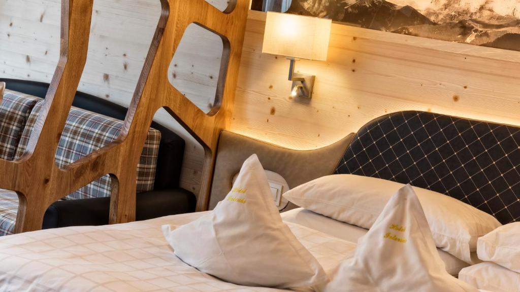 Postel nebo postele na pokoji v ubytování Hotel Interski