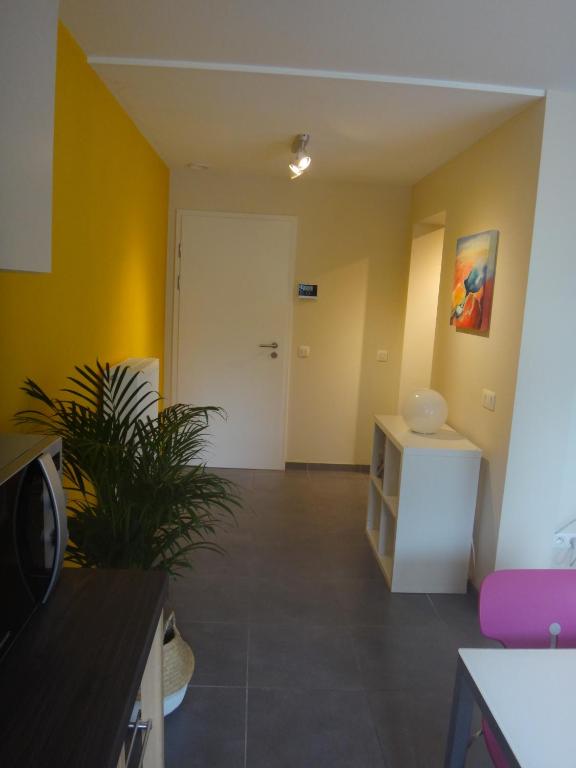 Posezení v ubytování Appartement rez Terrasse et Jardin