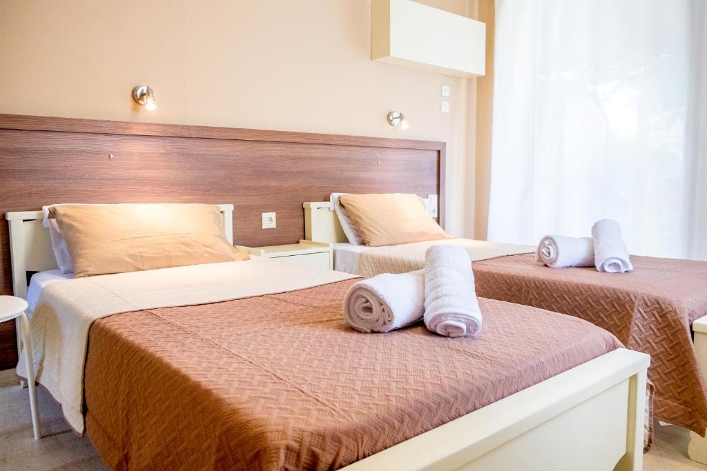 Postel nebo postele na pokoji v ubytování Paradisos