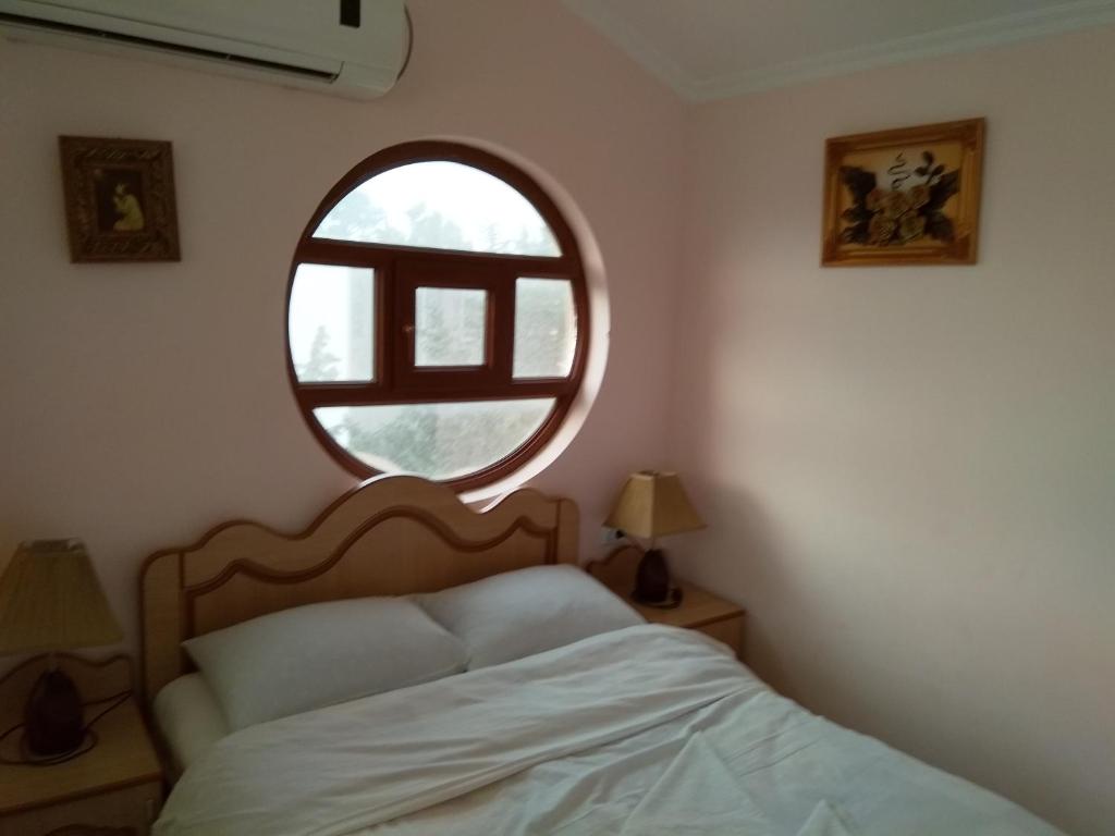 Postel nebo postele na pokoji v ubytování NNN Tourist