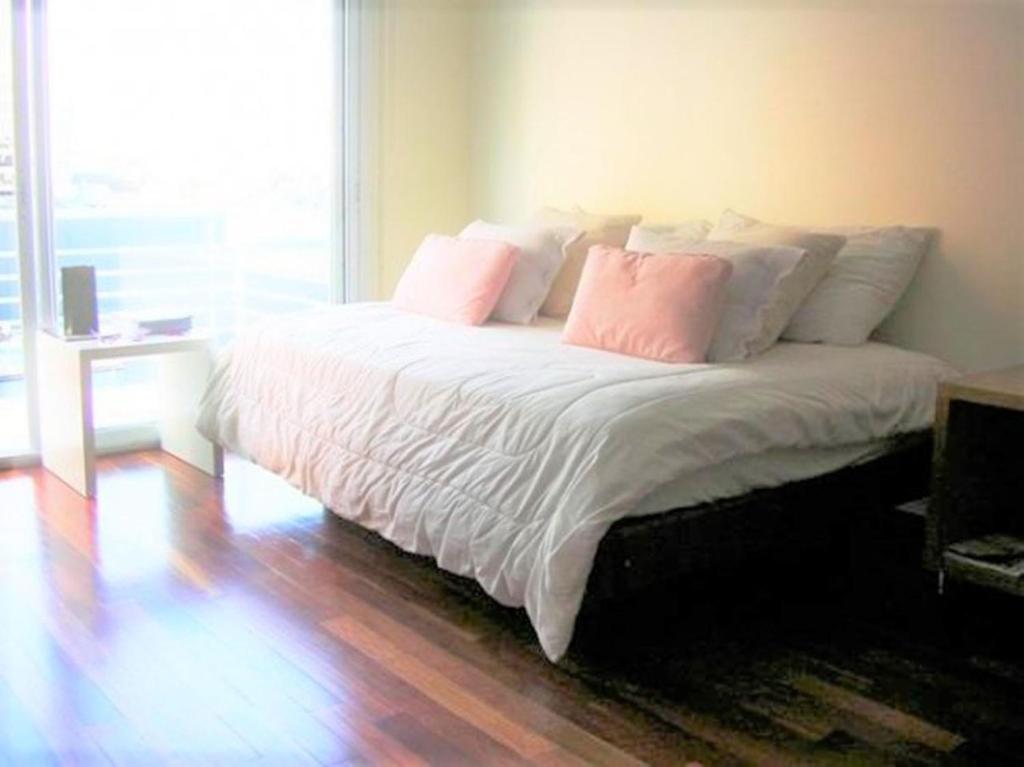 Ліжко або ліжка в номері Juncal Apartamento