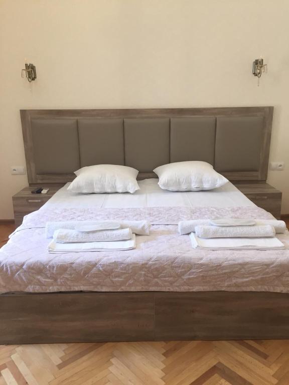 Postel nebo postele na pokoji v ubytování Guest House Rafael