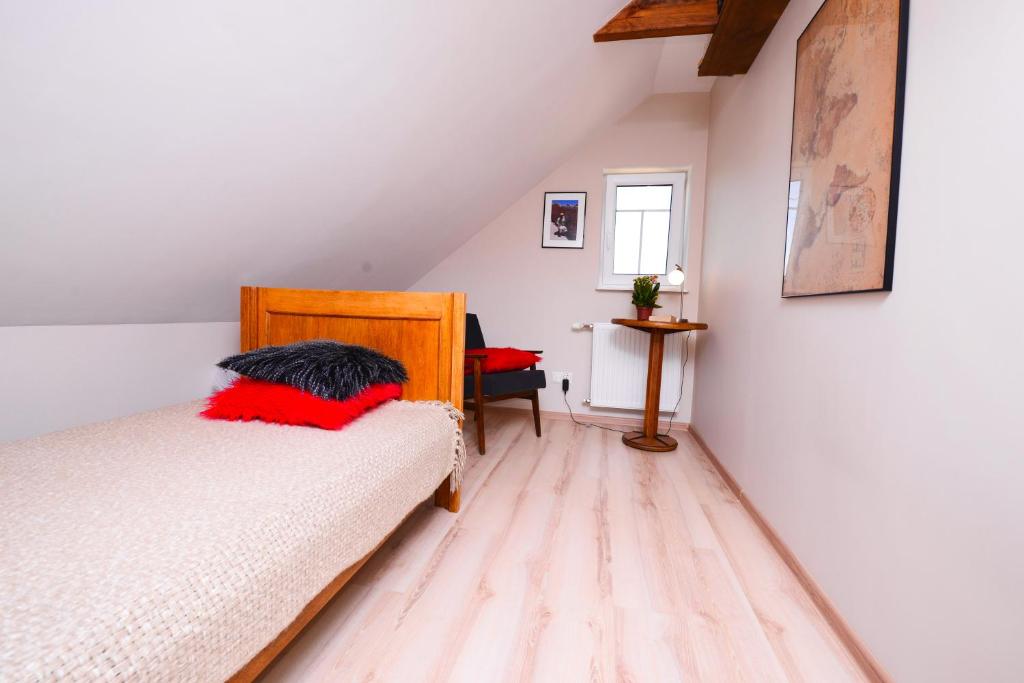 Posteľ alebo postele v izbe v ubytovaní Apartament Topczewo