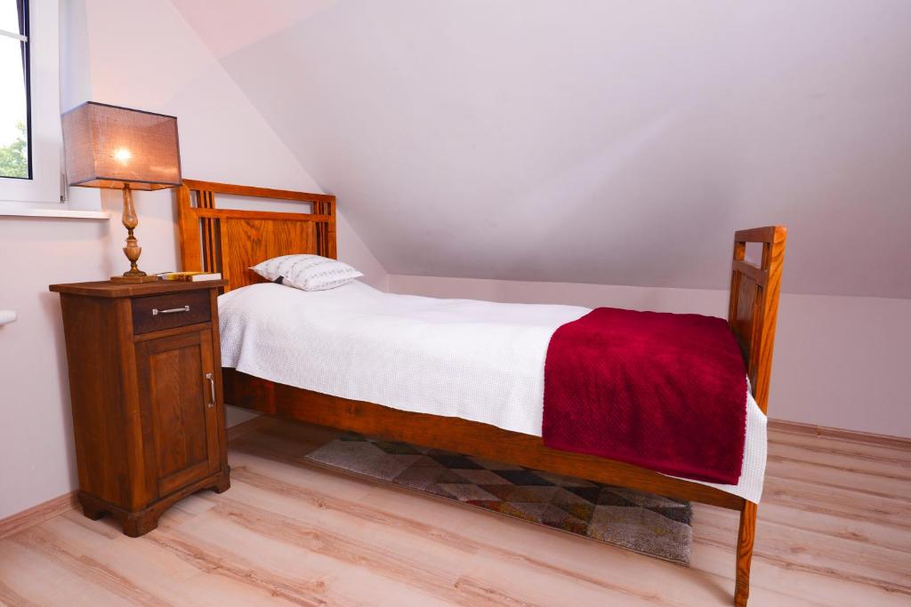 Posteľ alebo postele v izbe v ubytovaní Apartament Topczewo