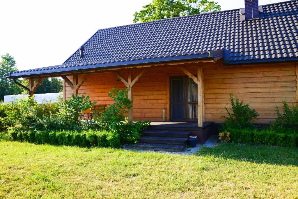 Vonkajšia záhrada v ubytovaní Apartament Topczewo