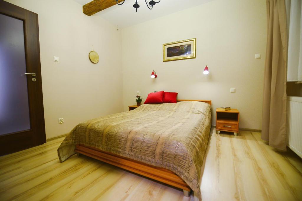Posteľ alebo postele v izbe v ubytovaní Apartament Topczewo