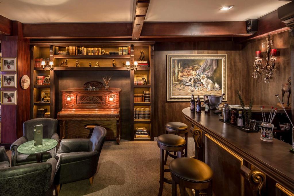 A área de bar ou lounge em Hotel Casa da Montanha